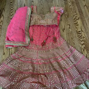 Pink and gold Lehenga Choli